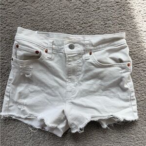 Levi’s White Distressed Denim Shorts